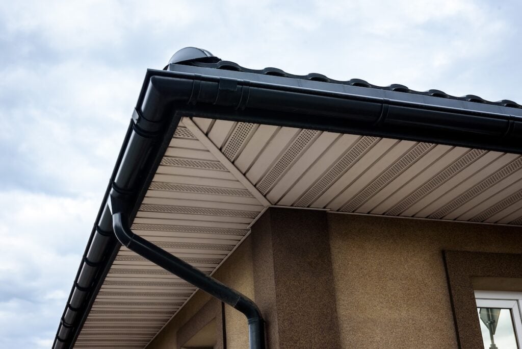 White soffit for providing optimal ventilation for roof overhangs.