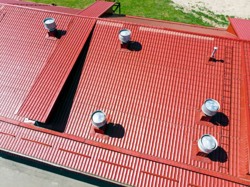 commercial roofing systems red metallic roof