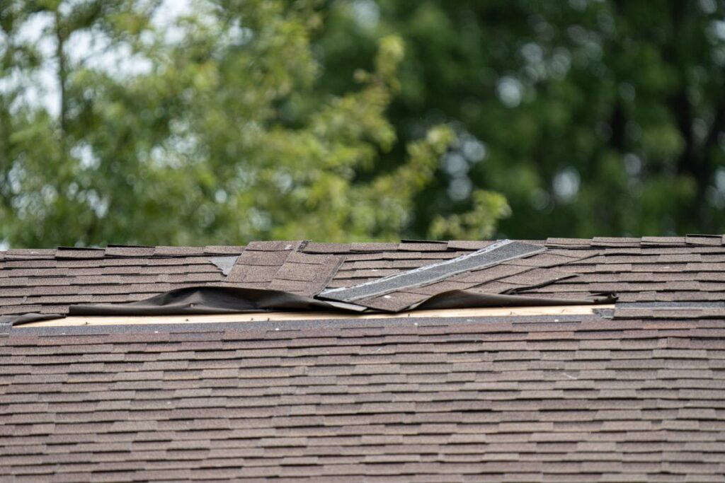 storm damage insurance claim few shingles missing