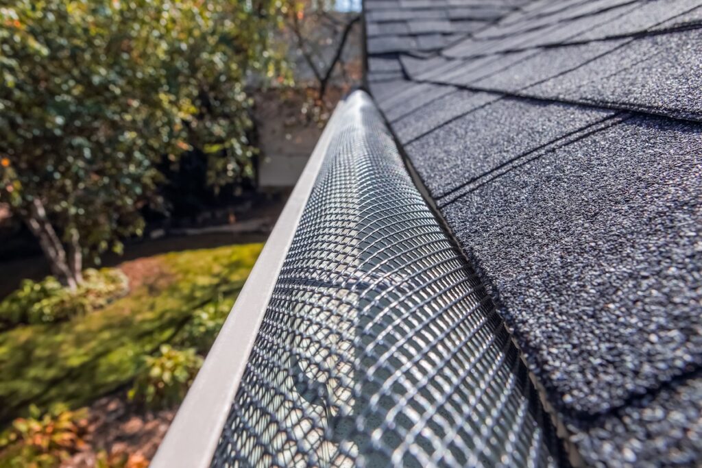 Mesh guards over troughs to prevent leaves and large debris from getting into gutters. 