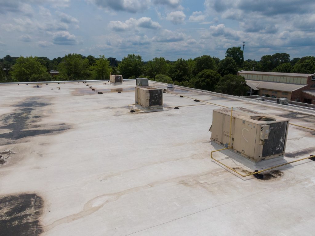 hail damage on tpo roof in bad conditions after storms